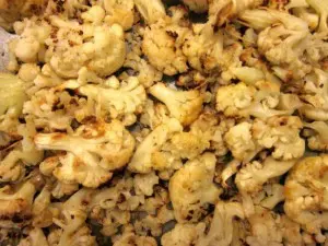 Seasoned roasted cauliflower florets with herbs.