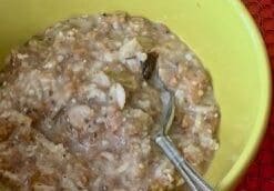Bowl of oatmeal with a spoon.