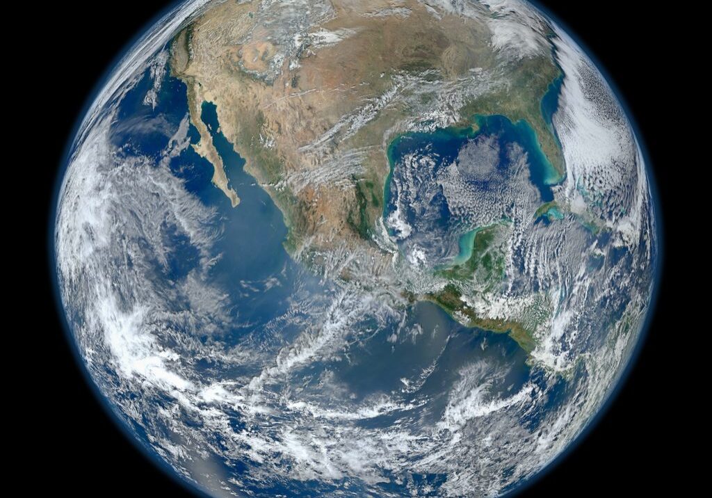 A full view of Earth from space showing North America and surrounding oceans.