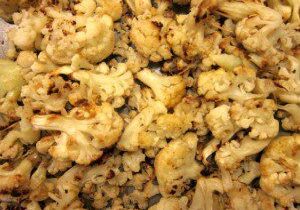 Seasoned roasted cauliflower florets with herbs.