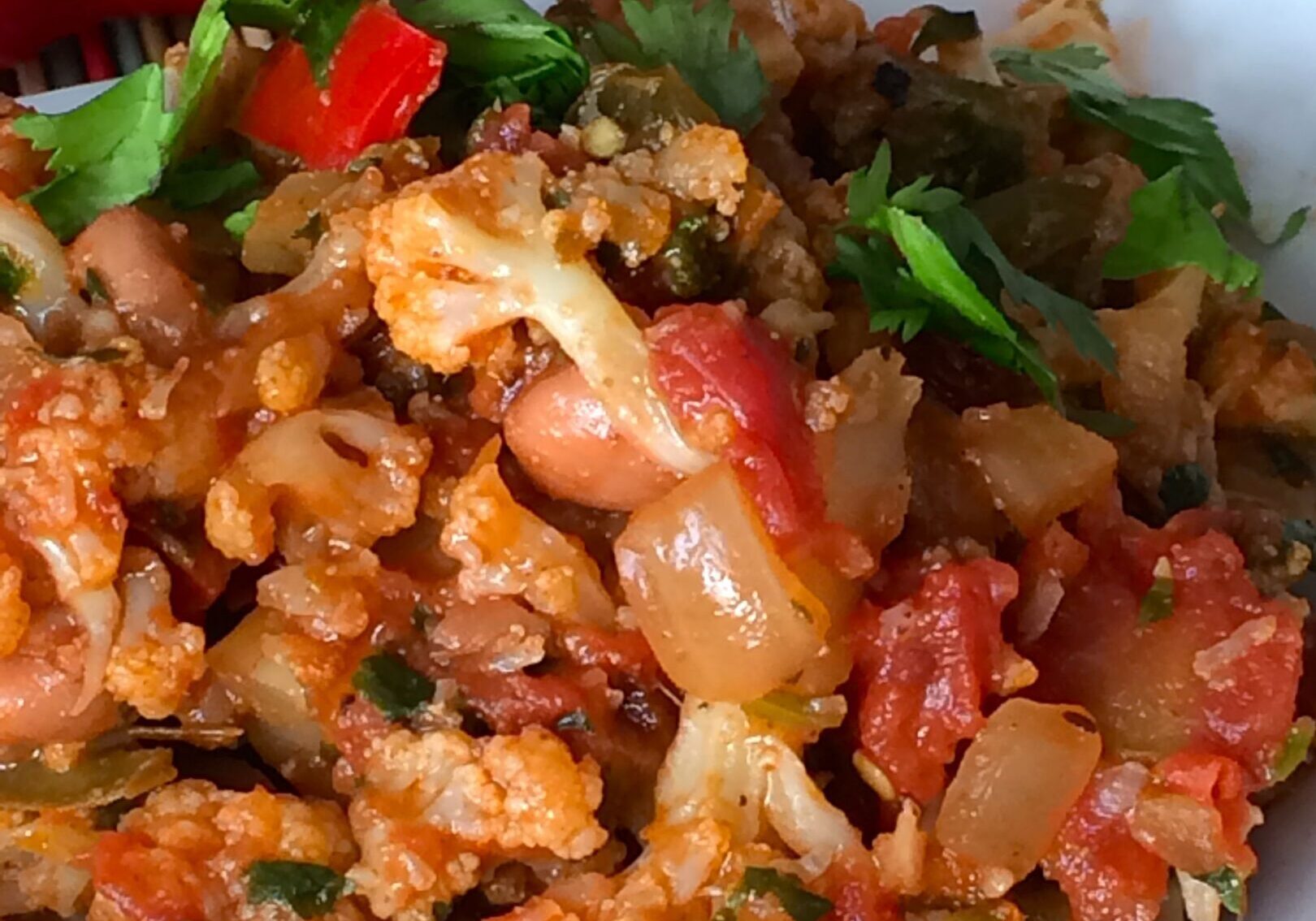 Spicy scrambled eggs with tomatoes and herbs.