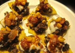 Mini chocolate and corn clusters on a plate.