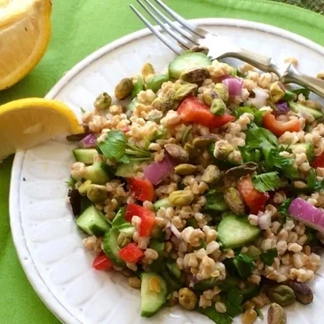 Colorful salad with grains and vegetables.